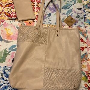 Made in India leather blush handbag. App. 16x15x4. Great condition.